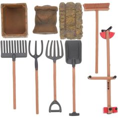 a collection of garden tools including rakes, shovels and other items