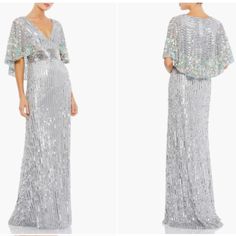 Mac Duggal Sequined Mesh Overlay; 100% Polyester Lining Fully Lined Through Body; Sheer Unlined Sleeves V-Neckline Cape Sleeves Intricate Rows Of Hand-Stitched Sequins And Beading Floral Detailing Featured Along Cape Concealed Back Zipper Approx. 62.5" From Top Of Shoulder To Bottom Hem Available Platinum (Silver) Style #5221 Bust: 42" Waist: 35" Hips: 45" **New Without Tags** Silver Embellished V-neck Evening Dress, Glamorous Silver V-neck Gown, Silver Glamorous Gown With V-neck, Silver V-neck Glamorous Gown, Silver V-neck Embellished Evening Dress, Halter Neck Gown, Mac Duggal Dresses, Beaded Bodice, Cape Sleeves