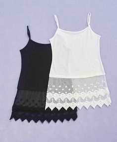 two women's tank tops with lace on the bottom and one is black and white