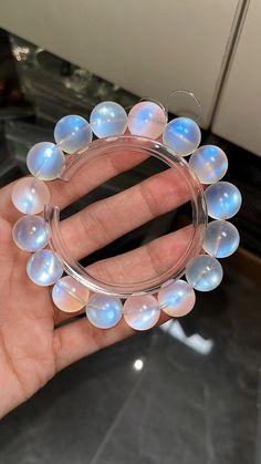 Material:moonstone beads size :Approx 13mm   quantity: one strand  6mm approx 29 pcs one strands 7mm approx25 pcs one strands 8mm approx 22 pcs one strands 9mm approx 21pcs one strands 10mm approx 19 pcs one strands 11mm approx 18pcs one strands 12mm approx 16 pcs one strands 13mm approx 16 pcs one strands 14mm approx 15 pcs one strands 15mm approx 14pcs one strands 16mm approx 14 pcs one strands 17mm approx 13pcs one strands 18mm approx 13pcs one strands 19mm approx 12pcs one strands 20mm appro Moonstone Round Beads Jewelry, Pearl White Crystal Bracelet With Round Beads, Hand-strung Round Moonstone Beaded Bracelets, Moonstone Beaded Bracelets For Healing, Moonstone Beaded Bracelets With Gemstones, Hand-strung Moonstone Beaded Bracelets, Moonstone Gemstone Beaded Bracelets With Round Beads, Handmade Moonstone Crystal Bracelet With Round Beads, Moonstone Gemstone Beaded Bracelets