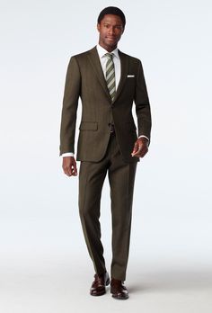 Farhill Herringbone Olive Suit Tan Suit With Olive Green Tie, Dark Olive Suit Men, Winter Business Suits With Herringbone Pattern, Winter Business Suit With Herringbone Pattern, Striped Business Suits For Winter, Striped Suits For Business In Winter, Striped Winter Business Suits, Professional Wool Suits For Fall, Striped Suits For Business Casual In Fall