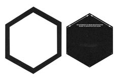 two black and white hexagonals with an inscription on the top one is blank