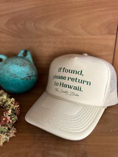 If you're ready to take the Hawaiian island vibes on the road with you, slip on this adjustable If Found, return to Hawaii trucker hat and head out! No more worries of it flying off mid-adventure, so you can focus on the journey and explore with ease. Aloha! Trucker Hat With Curved Brim For Travel, Curved Brim Trucker Hat For Travel, Trucker Style Hat With Curved Brim For Travel, Trucker Baseball Cap With Curved Brim For Travel, Adjustable Trucker Hat For Travel, Travel Snapback Hat One Size Fits Most, Trucker Snapback Hat For Travel, Snapback Trucker Hat For Travel, Trucker Snapback Hat With Curved Brim For Travel