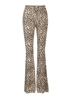 Bring out your wild side when you rock these animal print flared pants! The pants are made out of a leopard patterned fabric that looks and feels fabulous. These pants are slim fit from the hip through the knee that flares to a bell bottom leg. Pull-on elastic waistband. Available in sizes S, M, L and XL. Made out of 95% polyester and 5% spandex. Add to your natural fierceness with these rad pants! Measurements SIZE HIP WAIST INSEAM LENGTH S 15" 13" 35" 43" M 17" 14" 35.5" 43.5" L 19" 15" 36" 36 Leopard Flares, Skull Pants, Printed Bell Bottoms, Wild Leopard, Velvet Flare Pants, Printed Flare Pants, Leopard Print Leggings, Velvet Flares, Embroidered Denim Jacket