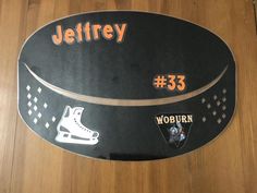 this is a sign that says jeffley 35 and has ice skates on it