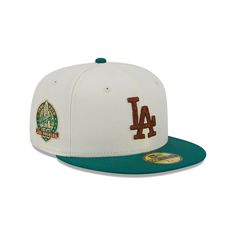 Let everyone know who you rep on Los Angeles Dodgers game days in fashion-forward style with this New Era Cooperstown Collection Camp 59FIFTY fitted hat. It offers a trendy high crown and a flat bill for a more street-ready and edgy look. The vibrant Los Angeles Dodgers graphics on the front and commemorative side patch ensure your fandom is highlighted loud and proud.Let everyone know who you rep on Los Angeles Dodgers game days in fashion-forward style with this New Era Cooperstown Collection Dodger Game, San Diego Padres, New Era Cap, Oakland Athletics, New Era 59fifty, Fitted Caps, Detroit Tigers, Philadelphia Phillies, New York Mets