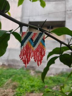 Traditional Festive Beaded Earrings With Colorful Beads, Traditional Beaded Dangle Earrings, Handwoven Round Beads Earrings As Gift, Handmade Earrings For Festivals, Traditional Drop Earrings With Tiny Beads, Colorful Rectangular Beaded Earrings As Gift, Traditional Rectangular Jewelry With Colorful Beads, Handmade Unique Beaded Earrings With Round Beads, Multicolor Handmade Danglers For Festive Occasions