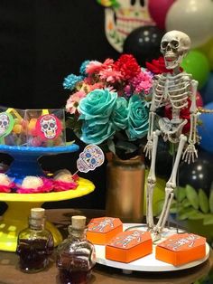 a table topped with lots of candy and decorations