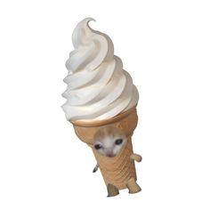 a small mouse is peeking out from behind an ice cream cone with white icing on it