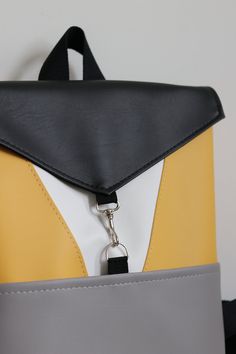 Trendy Faux Leather Backpack For School, Modern Faux Leather Backpack, Modern Faux Leather School Backpack, Modern Faux Leather Backpack For School, Modern Travel Bags In Polyurethane, Modern Faux Leather Backpack For Everyday, Modern Faux Leather Backpack For On-the-go, Modern Faux Leather Backpack With Adjustable Strap, Everyday Faux Leather Backpack With Adjustable Strap