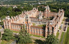 an aerial view of a large brick building