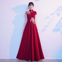 Long Embroidered Cheongsam For Wedding, Embroidered Long Cheongsam For Wedding, Long Cheongsam For Wedding, Wedding Cheongsam With Embroidered Stand Collar, Wedding Cheongsam With Stand Collar And Embroidery, Floor-length Ao Dai For Ceremonies, Embroidered Floor-length Ao Dai For Wedding, Full-length Floral Embroidered Wedding Gown, Full-length Wedding Gown With Floral Embroidery