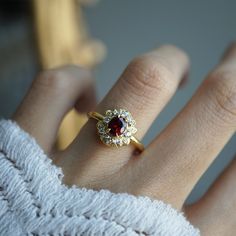 Indulge in timeless romance with the Rosaire spinel ring. Featuring a vibrant spinel center stone in a French-inspired setting, this ring captures and reflects light beautifully, reminiscent of Parisian nights. Crafted with delicate filigree, the Rosaire exudes elegance and vintage charm, making it the perfect symbol of eternal love. Ideal as a gift or a cherished addition to your collection, this stunning ring is a true treasure. All orders come in our Tippy Taste ring box. This ring is handmad