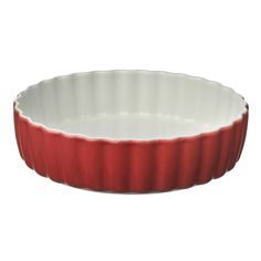 a red and white bowl on a white background with the bottom half raised to show it's rim