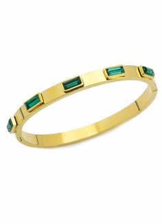 A gold metal bangle inlayed with emerald stones makes a perfect complement for your watch. Stand out with stylish bangles, wear them on their own or combine them together for a stack! Stainless steel hypoallergenic jewelry that is non reactive for sensitive skin and won't rust or tarnish. Artizan Jewelry is water resistant but it is recommended to use a jewelry cleaning cloth to help preserve color and shine. Stainless steel 18k gold plated 5 emerald zirconia stones encrusted 2.8" x 1.77" - Suit Non Reactive, Stylish Bangles, Jewelry Cleaning, Watch Stand, Hypoallergenic Jewelry, Emerald Stone, Cartier Love Bracelet, Cleaning Cloth, Sensitive Skin