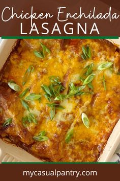 chicken enchilada lasagna in a casserole dish with fresh herbs on top