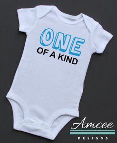 "This listing is for a custom infant bodysuit that reads: \"ONE OF A KIND\". It's perfect for to complete a first birthday outfit, 1st year photos, or even that adorable cake smash! ORDERING INSTRUCTIONS * Select SIZE/Sleeve Length from the Dropdown menu. * Select the color for \"ONE\" text from the Dropdown menu. * The \"OF A KIND\" text is made in BLACK, unless you request otherwise. If you want a different color combo send us a note/message with your order. (See color chart images for color o 1 Year Photos, 1st Birthday Outfit, First Birthday Outfit, 1st Birthday Outfits, First Birthday Outfits, 1st Year, Little Outfits, Gender Neutral Baby