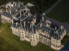 an aerial view of a large castle like building