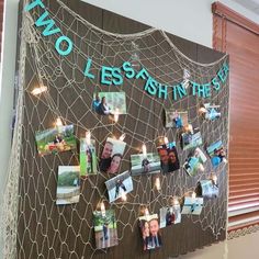 a bulletin board with pictures and candles on it