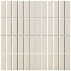 a white tile wall that is very close to the ground