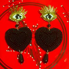 Eye Catching Beaded Eye Heart Post Earrings The Eye Is To Stare Off Evil. The Heart Is To Bring Love. Black & White Seed Beads Total Inch Is 3.5 Eye 1" Heart 1.5 By 1.5 Dangled Bead 1/2 " Handmade Black Dangle Heart Earrings, Handmade Black Heart Dangle Earrings, Dangle Beaded Earrings With Heart Beads For Party, Black Heart Earrings For Parties, Black Beaded Heart-shaped Jewelry, Beaded Dangle Heart Earrings For Parties, Heart Shaped Beaded Earrings For Party, Elegant Beaded Earrings With Heart Beads For Parties, Elegant Beaded Heart Earrings For Party