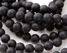 Beaders love our black onyx beads because of their great color, polish, and consistency. Black Onyx is never going out of style! Use these beads in practically any design - they always look great. Nearly all beads referred to as “black onyx” on the market today, including ours, are color enhanced. This centuries-old process creates a permanent, consistent black color and does not reduce the value of the beads. Black onyx is a color-treated form of grey chalcedony, usually sourced from Asia. True Beads Online, Bead Store, Onyx Bead, Black Agate, Out Of Style, Black Onyx, Czech Glass, Gemstone Beads, Onyx