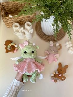 a person holding a stuffed animal next to some decorations