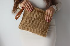 Straw Clutch Bag , Raffia Clutch Bag, Crochet Raffia Bag , Hand Woven Bag , Boho Clutch , Natural raffia bag , handmade Straw bag , straw beach bag , straw tote bag , Straw Purse, vintage straw bag , luxury bag , evening clutch , handmade gift bag , gifts for women ⭐️Specifications:⭐️ Our bag is entirely handmade! Made from 100% raffia paper thread, ensuring high quality and durability. Custom-made to suit your preferences. Interior pocket. Wipeable raffia rope. Lightweight and portable . 🎁International fast and free shipping (Note: Dimensions may vary by 1-2 cm depending on the rope condition) Please contact us for different colors and sizes. I will do my best to assist you. Discount available. Processing time: 4-5 days 📌Cleaning and Care: Clean gently with a damp cloth. Avoid excessive Daily Use Straw Crochet Pouch Bag, Straw Pouch Bag With Braided Handles, Natural Straw Bag With Braided Handles, Beige Woven Straw Clutch Bag, Casual Straw Clutch With Braided Handles, Woven Beige Straw Clutch Bag, Jute Crochet Pouch Bag With Braided Handles, Crochet Jute Pouch Bag With Braided Handles, Crochet Jute Bag With Braided Handles