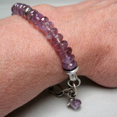 "Chain bracelet in oxidized silver and amethyst, it is composed of a part made of silver with long and flat hammered links; and a string of amethyst. The rings, end cylinders, spacers, and pendants are all sterling silver and handcrafted. Weight: 0,60 oz Length 7,48\" It is a light, original bracelet, beautiful to always wear, alone or combined with other bracelets. Jewel made original by craftsmanship, which adds value and characteristics to each of my pieces. Thank you for visiting, if you wan Modern Purple Bracelet Jewelry, Dangle Bracelet, Silver Chain Bracelet, Silver Wedding Rings, Amethyst Bracelet, Bracelet Sterling Silver, Oxidized Silver, The Rings, Sterling Silver Chain