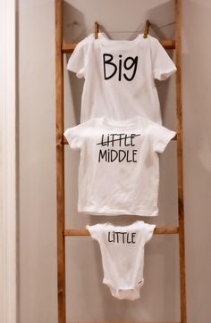 This adorable set of youth, toddler, & baby tees is perfect for your pregnancy announcement, or a gift for families with their third baby on the way!  Plus they make a very special keepsake even when they're grown out of 🥰 These short-sleeved tees are soft and comfortable for little ones thanks to their cotton jersey material.  Both tees and the baby bodysuit are bright white, and the font will be black, unless otherwise discussed via messages. 🤍 * * * * * * * * * * * * * * * * * * * * * * * * * * * * * * * * * * * * * * *  Feel free to message us with any questions or requests! 💌 White Family Matching T-shirt, Father's Day Personalized Matching T-shirt, Funny Personalized White T-shirt, Matching Family Personalized T-shirts, White Family Matching Tops, White Cotton Top For Gender Reveal, Personalized Cotton T-shirt For Gender Reveal, Personalized White Family Matching Tops, Funny White Tops For Gender Reveal