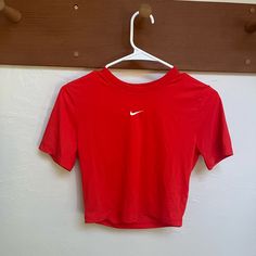 Never Worn, Womens Nike Crop Top Tee. Soft Fabric Nike Casual Top In University Red, Red Nike T-shirt For Summer, Nike Red T-shirt For Summer, Trendy Nike Short Sleeve Tops, Nike Sporty Tops In University Red, Nike Red Sporty Tops, Nike Sporty University Red Tops, Nike Sporty Red Top, Sporty University Red Tops For Spring