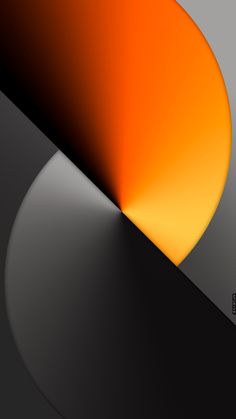 an orange and yellow light reflecting off the side of a black surface on a gray background