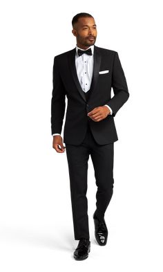 A slim black tuxedo with one button and a slightly rounded notch lapel. Black Tie Tuxedo Blazer With Notch Lapel, Wedding Tuxedo With Notch Lapel And Single Button, Black Single Breasted Tuxedo For Formal Occasions, Black Single-breasted Tuxedo For Black Tie, Black Tie Single Button Blazer With Notch Lapel, Formal Black Single Breasted Tuxedo, Black Tie Single Button Blazer, Notch Lapel Single Button Blazer For Black Tie, Classic Single-button Wedding Tuxedo