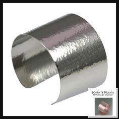 Add a touch of elegance to your style with our 1 3/4 Inch Wide Hammered Stainless Steel Cuff Bracelet 💍✨ Hypoallergenic and anti-tarnish, this minimalist cuff is perfect for everyday wear or special occasions 💫 Celebrate your 11th wedding anniversary in style with this timeless piece 💕 Available now for only $65.00 💰 #cuffbracelet #stainlesssteel #minimalistj Elegant Hammered Cuff Bracelet, Elegant Hammered Adjustable Cuff Bracelet, Elegant Hammered Cuff Bracelet Gift, Elegant Hammered Cuff Bracelet As Gift, Elegant Hammered Cuff Bangle, Elegant Formal Hammered Cuff Bracelet, Modern Round Cuff Bracelet For Wedding, Elegant Nickel-free Cuff Bracelets, Modern Silver Bracelets For Wedding