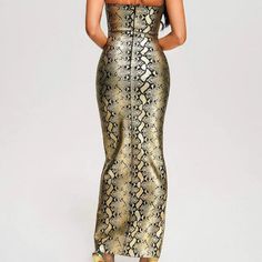 Introducing the Hot Fashionista Vickie Strapless Snakeskin Print Front Lace Up Maxi Dress – a bold and trendsetting ensemble that combines contemporary design with a touch of exotic flair. This maxi dress is designed to make a statement, featuring a snakeskin print, a strapless silhouette, and a front lace-up detail that adds a daring and fashionable edge. Key Features: Strapless Elegance: The dress embraces a strapless silhouette, showcasing the shoulders and collarbone for an alluring and soph Elegant Bodycon Leopard Print Dress, Luxury Leopard Print Formal Dress, Luxury Elegant Leopard Print Dress, Chic Fitted Tiger Print Dress, Maxi Dress Snake Print, Solid Dress Casual, Waistcoat Sweater, Long Sleeve Dress Formal, Chic Party