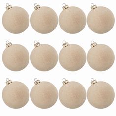 twelve beige christmas balls with gold trims on each ornament, set of 12