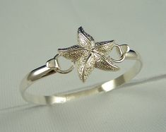 Cape Cod Convertible Sterling Silver Starfish Bracelet Elegant Silver Starfish Jewelry, Elegant Starfish-shaped Nickel-free Jewelry, Elegant Nickel-free Starfish Jewelry, Elegant Starfish Bracelet For Gift, Silver Starfish Bracelet, Adjustable Silver Starfish Jewelry, Silver Starfish Bracelet For Gift, Sealife Jewelry, Sea Life Jewelry