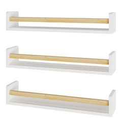 three white shelves with wooden handles