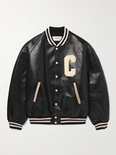 This version of CELINE HOMME's 'Teddy' bomber jacket comes in supple black leather, so it feels really luxe. It's cut for a roomy fit and has blouson-style sleeves and traditional striped trims. The brand's varsity-style 'C' logo is appliquéd on the chest in place of an actual college crest. Leather Varsity Jackets, Adidas Crazy, Biker Jackets, Mens Designer Fashion, Leather Logo, Leather Design, Mr Porter, Biker Jacket, Hoodie Jacket