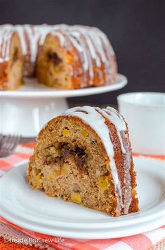 a bundt cake with white icing on a plate