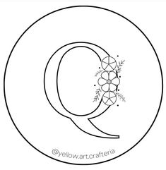 the letter q is decorated with flowers and leaves in black and white, as well as an