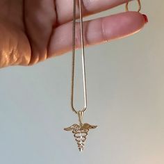 14k Gold Signed Michael Anthony Nurse Pendant. Yellow Gold Diamond Cut Rn Registered Nurse Caduceus Charm Pendant. This Is Pre Loved And In Excellent Condition! A Great Gift For That Special Nurse Or Nursing Student In Your Life! ****Chain Not Included - Simply Used For Photo Purposes But Will Be Available In Separate Listing Soon! - H: 5/8 In Without Out Bail - H: 7/8 In With Fixed Bail - 3/4 In Wide At Widest Point - 0.65 Grams Michael Anthony, Gold Sign, Nursing Student, Registered Nurse, Diamond Cut, Charm Pendant, Womens Jewelry Necklace, Gold Diamond, Nursing