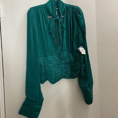 Gorgeous Free People Blouse In Green. Silky Fabric And Adjustable Tie. Item Is A Large, Nwt And Has Extra Button Attached. Spring Ruched Long Sleeve Blouse, Spring Ruched Blouse, Spring Long Sleeve Ruched Blouse, Long Sleeve Ruched Blouse For Brunch, Elegant Green Ruched Top, Elegant Green Top With Gathered Sleeves, Ruched V-neck Blouse For Work, Spring Green Ruched Blouse, Chic Green Top With Gathered Sleeves