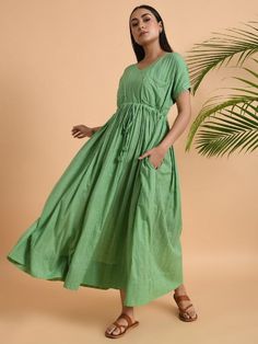 A free size long maxi dress with drawstring at the waist and double pockets Garment measurements (in Inches): Free Size: Bust: 50", Waist: 48", Length: 52" Fabric: Cotton Dobby Color: Green Fit: Model height is 5'7" Model is wearing a size S Loose and comfortable fit. Instructions: Hand wash separately in cold water Note: Available in other colors Pants not included with the product Pants can be bought separately This product will be shipped within 20-25 days of order placed. Pocket Maxi Dress, Green Fits, Colored Pants, Long Maxi, Best Deal, Long Maxi Dress, Model Height, Fabric Cotton, Free Size