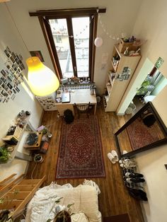 an overhead view of a living room with wood floors