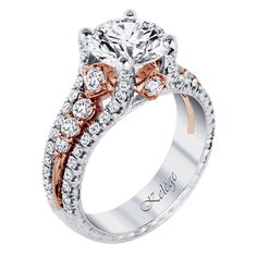 a diamond engagement ring with two tone gold and white diamonds on the band, set in 18k rose gold