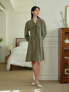 Composition : Rayon 80% , Polyester 20%Color: KhakiCountry of Origin : Republic of Korea Chic Khaki Dress For Daywear, Khaki Midi Dress For Spring Daywear, Elegant Khaki Dress For Daywear, Khaki Dress, Ribbon Tie, Long Dress, Composition, Ribbon, The Originals