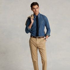 Dyed for a deep saturated color these flat-front trousers are crafted with stretch cotton chino that is specially treated for an ultrasoft texture. Brown Pants Blue Shirt Men, Chino Pants Outfit Men, Blue Oxford Shirt, Dress Pants Outfits, Dark Blue Shirt, White Shoes Men, Pants Outfit Men, Chino Pants Men, Khaki Pants Men