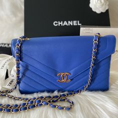 Authentic Chanel Flap Bag, Medium, Gold Hardware, Crossbody Strap. Unique Color And Style. This Bag Has Only Been Worn A Few Times And Is In Excellent Condition. No Scratches To The Hardware. I Will Not Entertain Lowball Offers. High-end Blue Crossbody Shoulder Bag, High-end Blue Shoulder Bag With Removable Pouch, Luxury Blue Flap Bag For Travel, Designer Blue Flap Bag With Removable Pouch, High-end Blue Bag, Luxury Envelope Bag For Shopping, Luxury Envelope Shopping Bag, Blue Flap Bag With Dust Bag, Blue Flap Bag With Removable Pouch For Formal Occasions