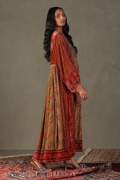 Orange puff sleeve dress with all over tonal, miniature floral prints, highlighted with an embroidered bodice using zardozi and sootha work. - Aza Fashions Festive Dresses With Gathered Sleeves, Long Sleeve Anarkali Dress With Printed Motifs, Anarkali Dress With Printed Motifs And Long Sleeves, Festive Dresses With Embroidered Sleeves For Festivals, Festive Dresses With Embroidered Sleeves, Bohemian Dresses With Chikankari Embroidery For Transitional Season, Long Sleeve Dresses With Printed Motifs For Eid, Bohemian Eid Dresses With Embroidered Sleeves, Bohemian Dresses With Embroidered Sleeves For Eid